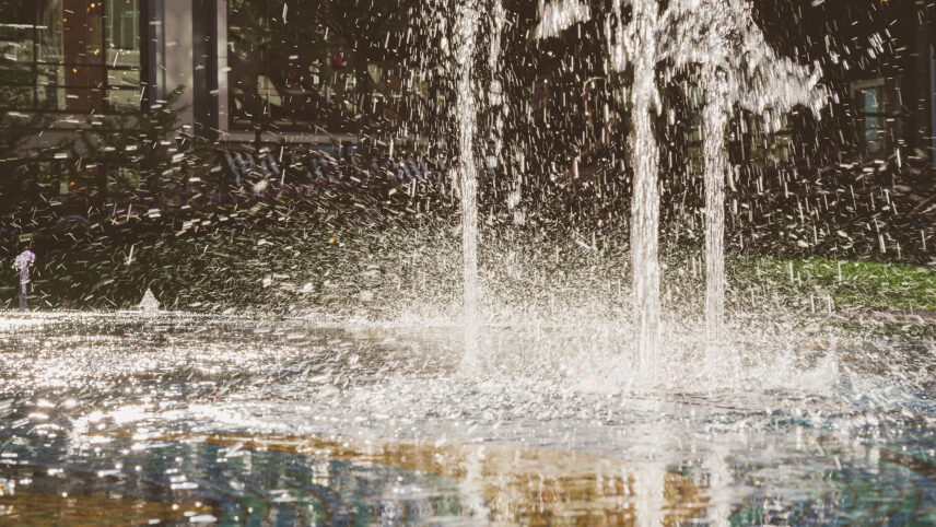 Saanich West neighborhood of Victoria, BC, with sunlight reflecting off the splashing water