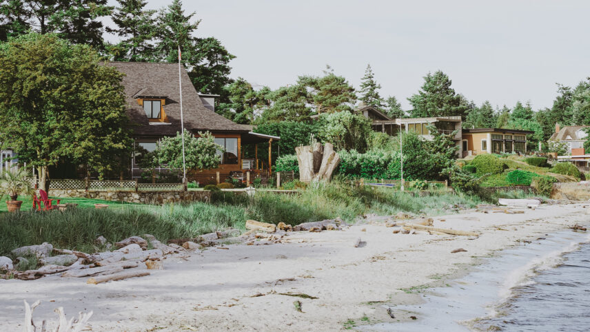 Beachfront property with lush greenery and direct water access located in the Saanich East area of Victoria, BC