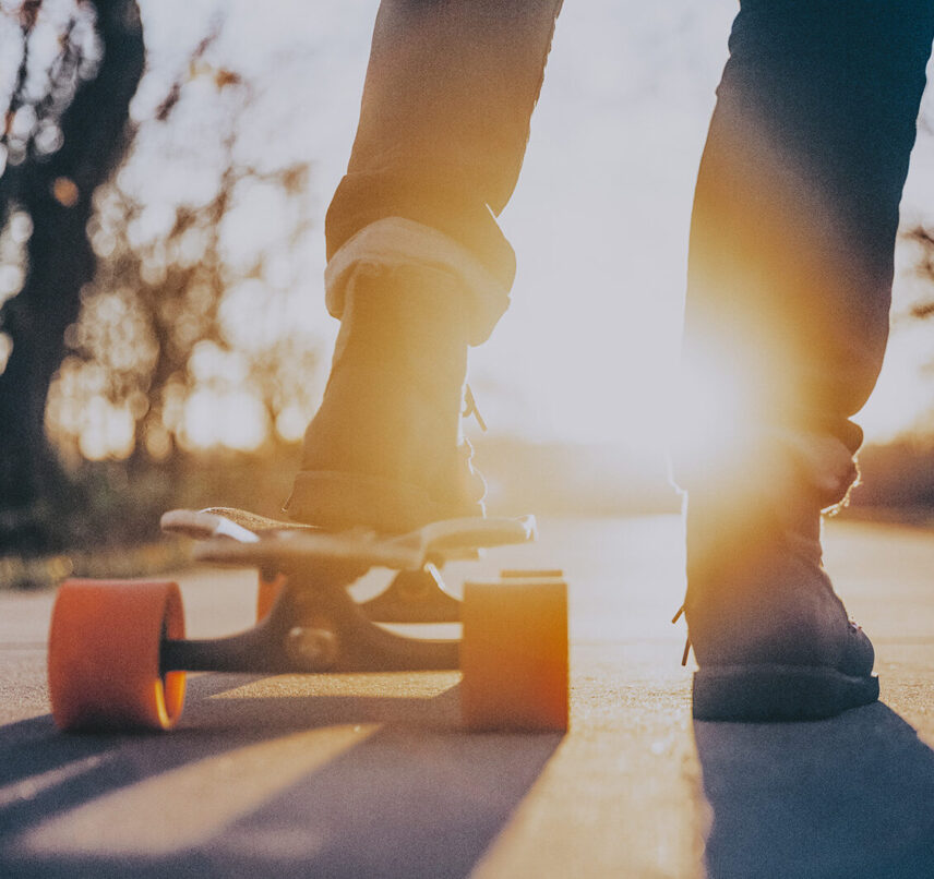 Close-up of a skateboard rider at sunset in Victoria, BC