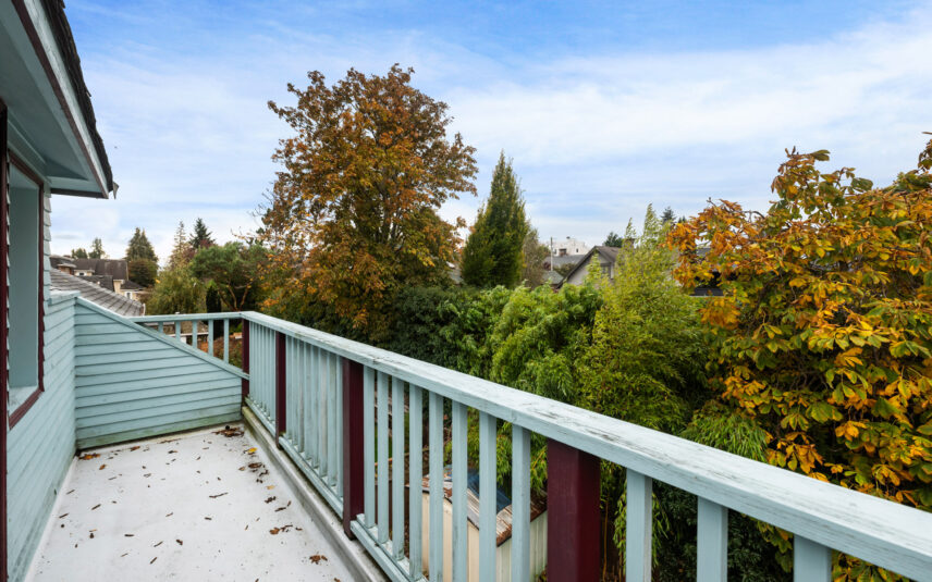 Private balcony at 624 Cornwall Street Victoria BC listed by Folio Group at Clover Residential featuring scenic views of mature trees and a peaceful Fairfield neighborhood atmosphere