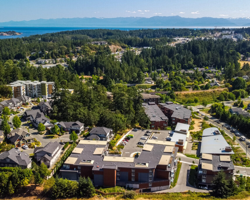 Aerial view of the Thetis Lakeside development and surrounding neighborhood near 101 Presley Place, listed by Folio Group at Clover Residential in Victoria, BC