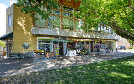 Mother Nature's Market and Booster Juice storefronts at 1035 Sutlej Street, Victoria, BC