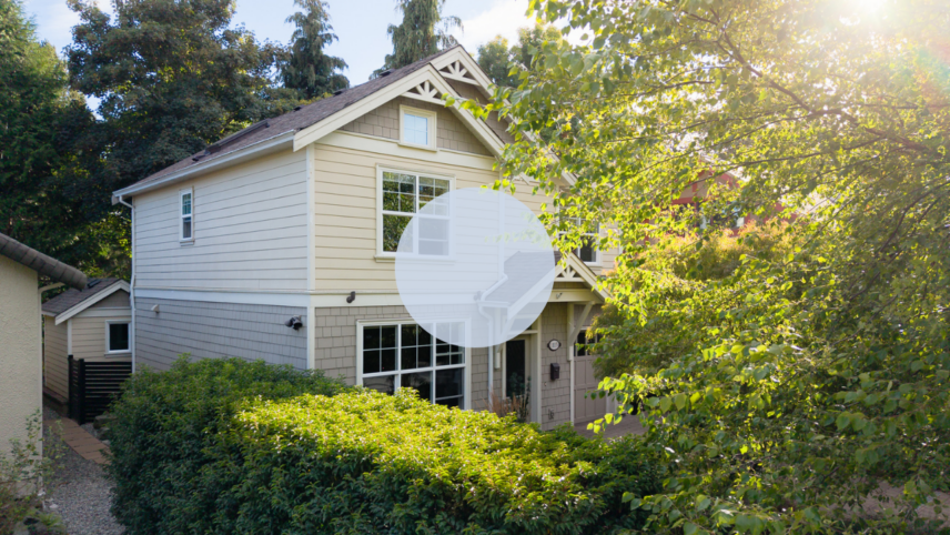 Custom-built 2015 home exterior at 1115 Faithful St in Fairfield, Victoria BC, surrounded by mature trees and greenery